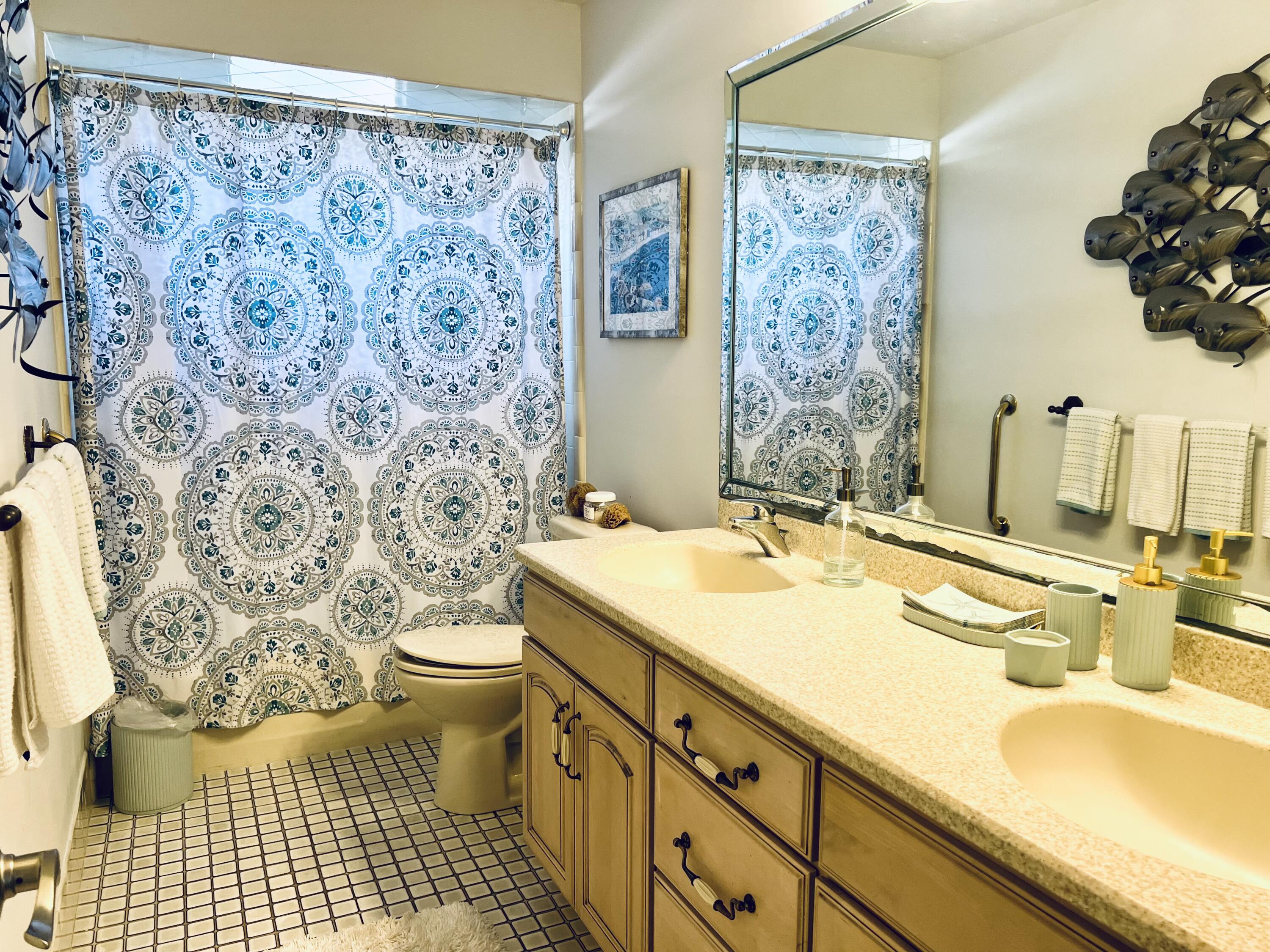 410 Rio Casa Drive South Indialantic, FL 32903 - Photo 17 of 25 a bathroom with a sink and a toilet