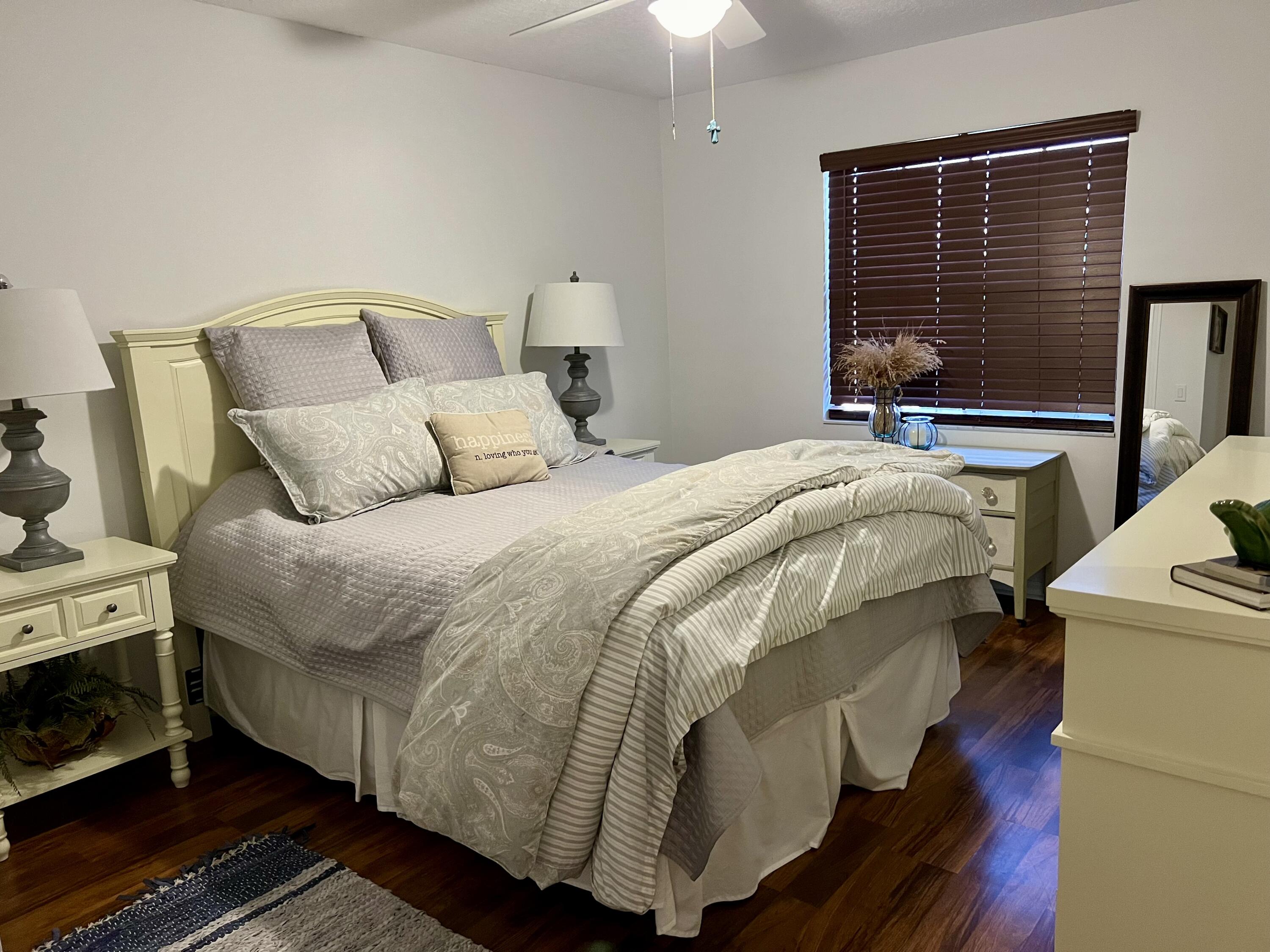 410 Rio Casa Drive South Indialantic, FL 32903 - Photo 18 of 25 a bedroom with a bed and a window