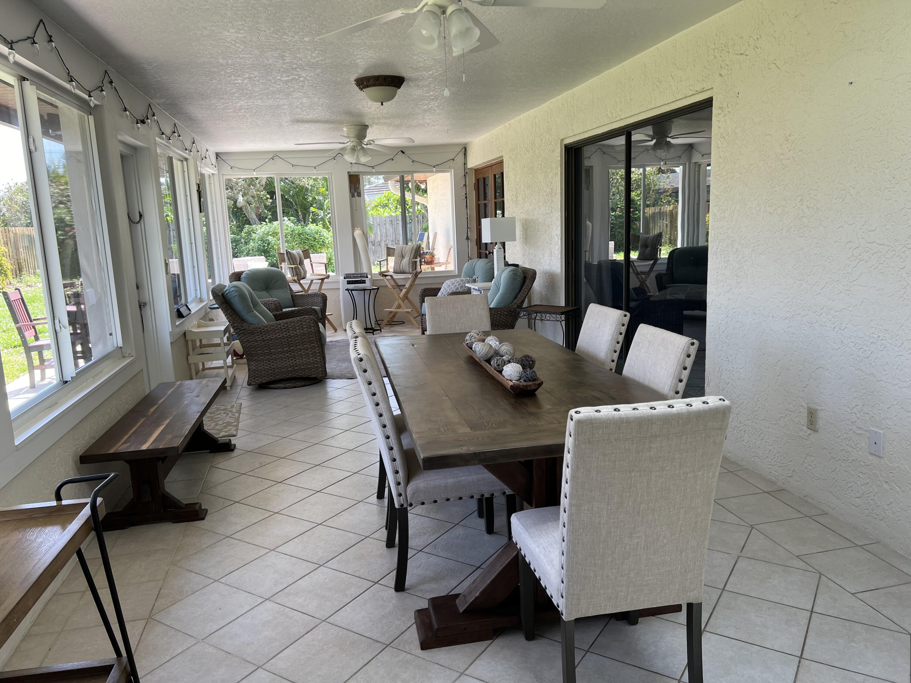 410 Rio Casa Drive South Indialantic, FL 32903 - Photo 20 of 25 a dining room with furniture and a window
