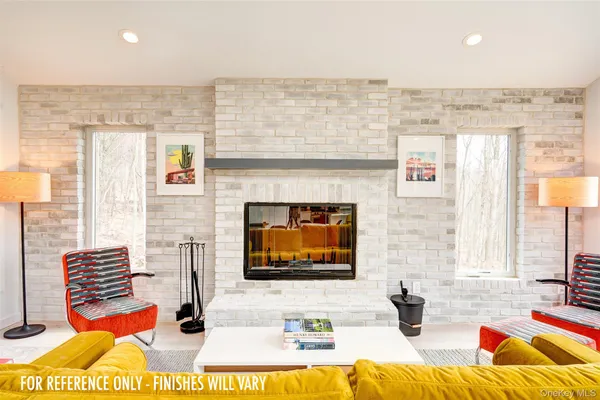 a kitchen with stainless steel appliances a stove a sink and a refrigerator