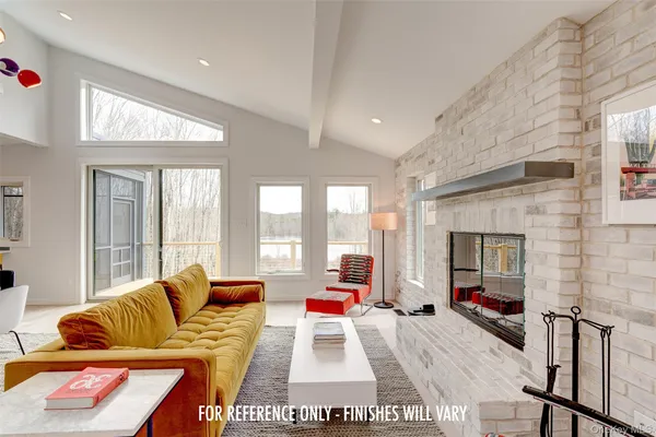 a living room with furniture and a table