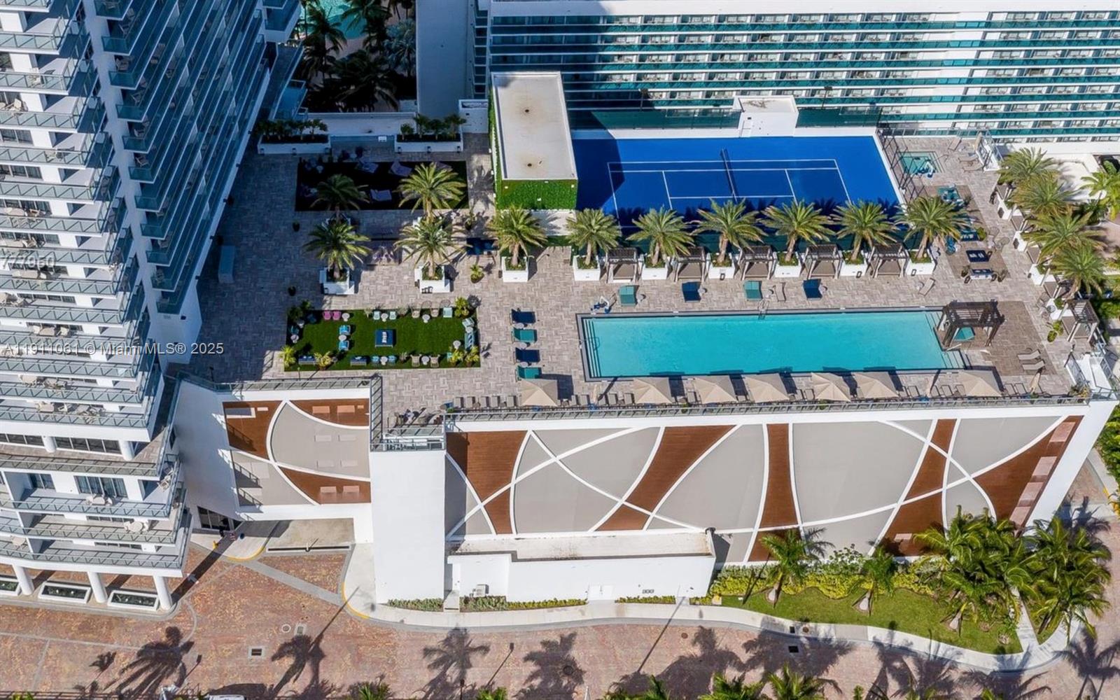 4010 South Ocean Drive, Unit R3206 Hollywood, FL 33019 - Photo 29 of 37 an aerial view of a house with yard swimming pool and outdoor seating