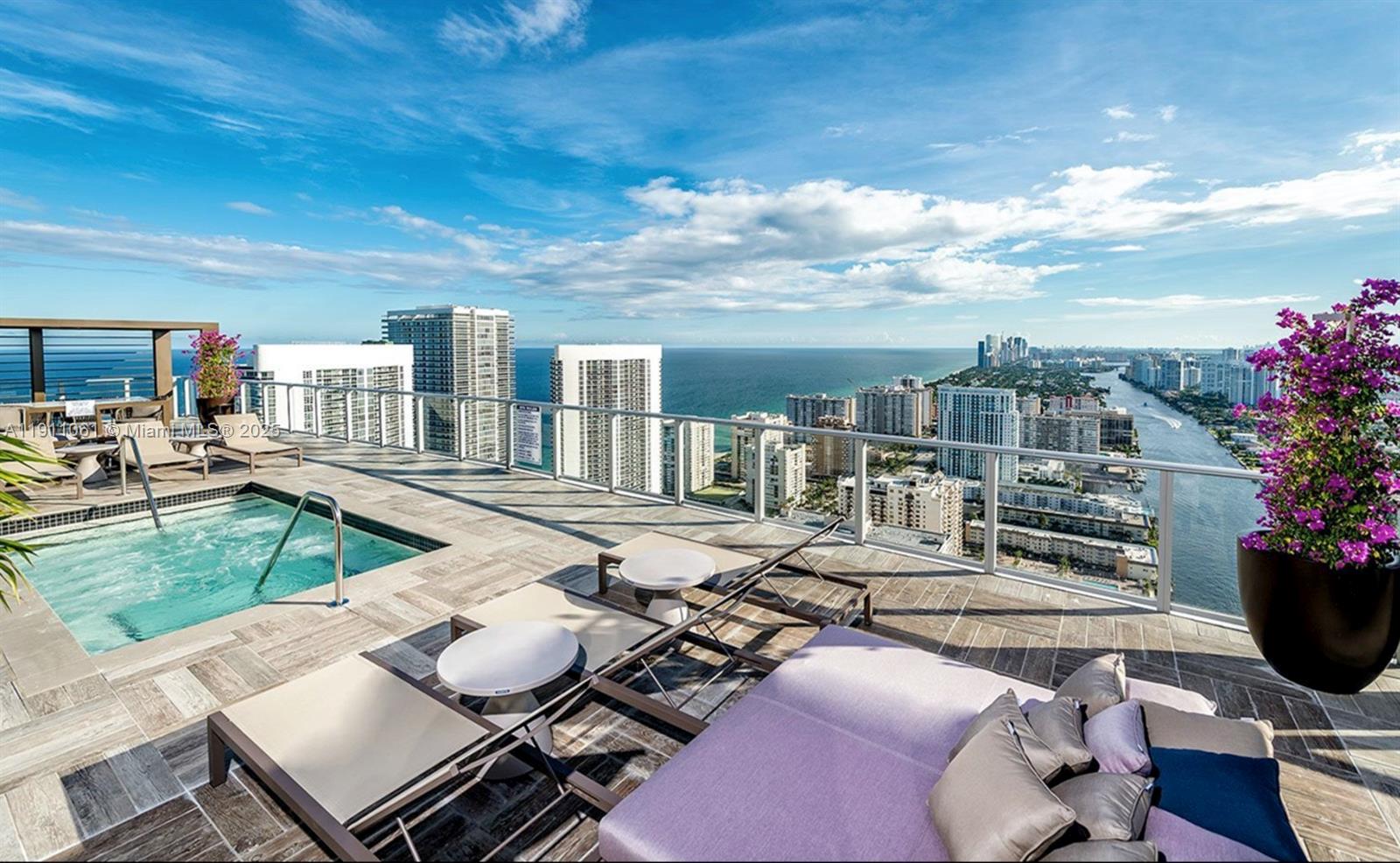 4010 South Ocean Drive, Unit R3206 Hollywood, FL 33019 - Photo 30 of 37 a view of a patio with couches table and chairs and potted plants