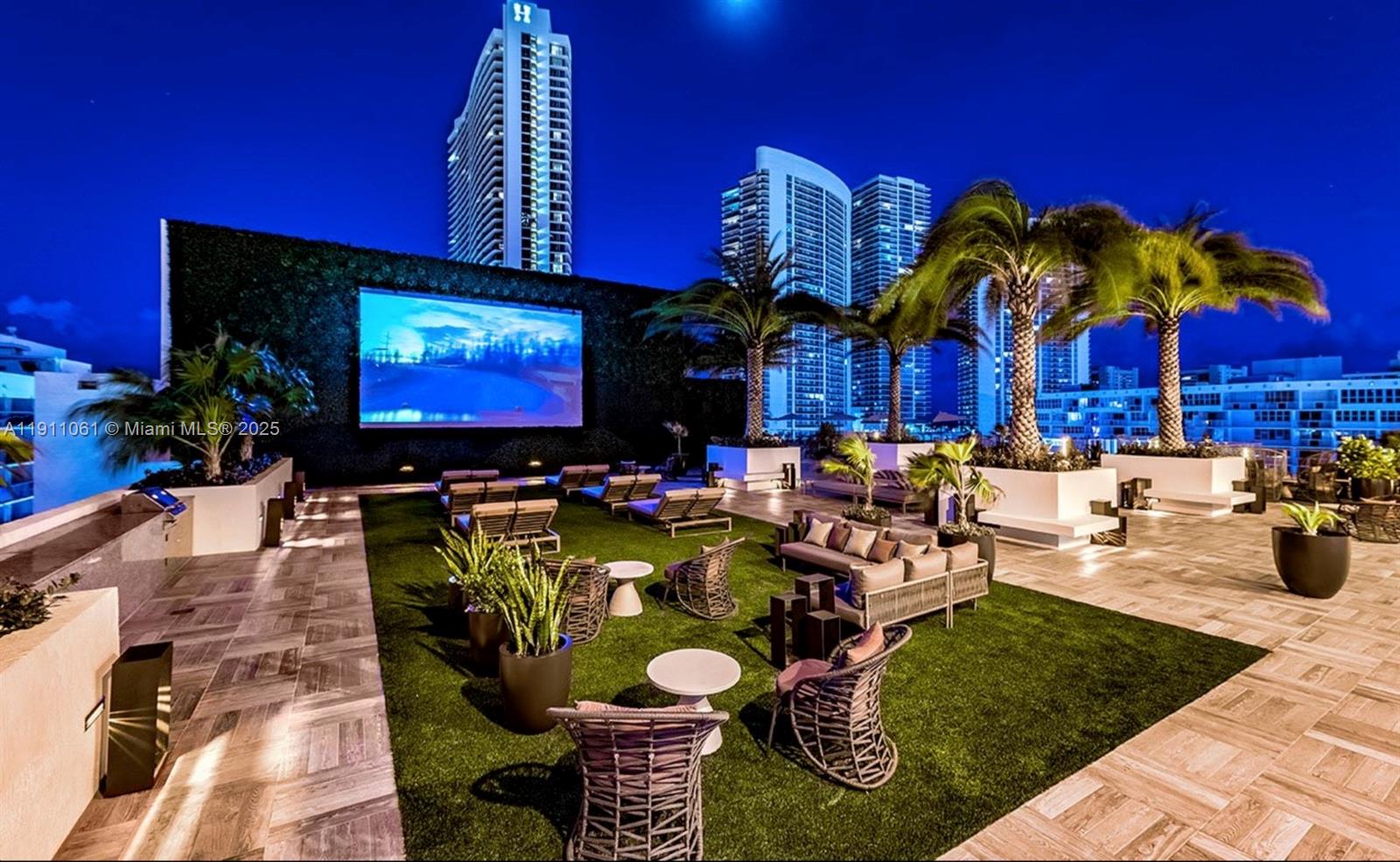 4010 South Ocean Drive, Unit R3206 Hollywood, FL 33019 - Photo 36 of 37 a group of people sitting in front of retail shop