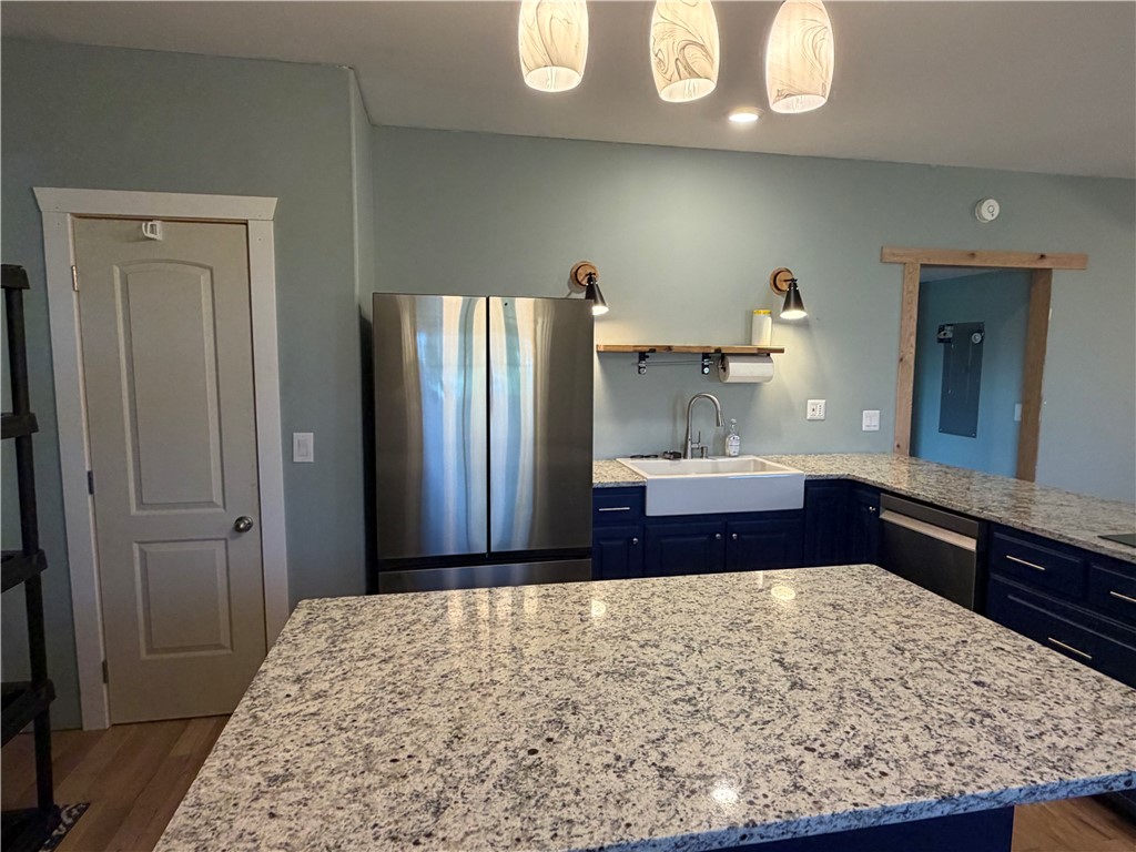 707 South Spring Street Walhalla, SC 29691 - Photo 11 of 20 This bright kitchen features ample counter space and modern appliances, perfect for everyday living.