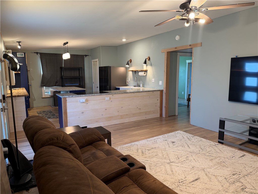 707 South Spring Street Walhalla, SC 29691 - Photo 5 of 20 This inviting space combines a functional kitchen with comfortable living, ideal for relaxed entertaining.