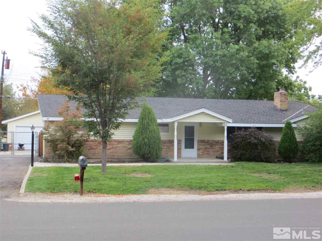 270 Fillmore Way Reno, NV 89519 - Photo 1 of 1 a front view of a house with a yard