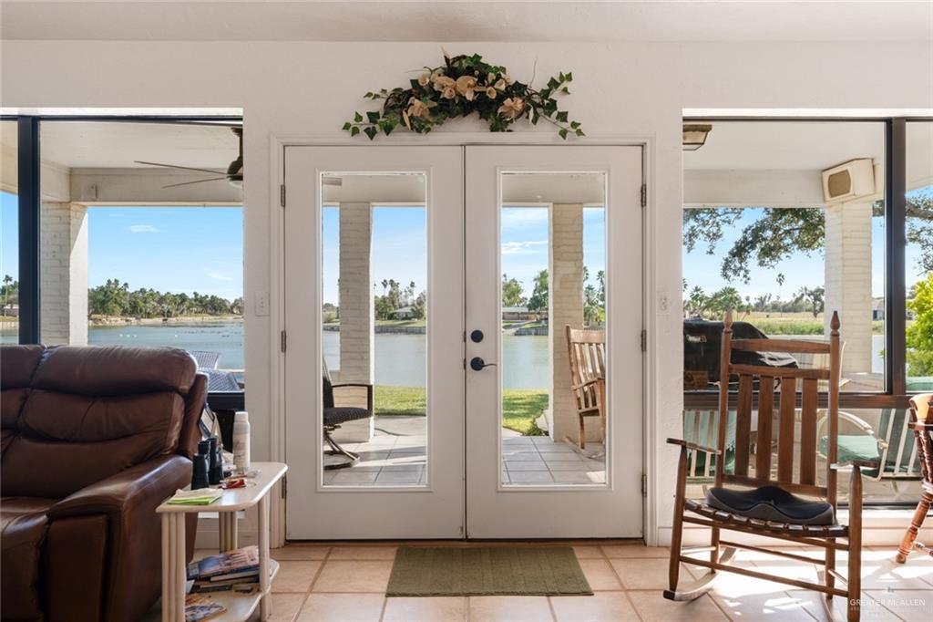 1420 West Estero Drive Progreso Lakes, TX 78596 - Photo 17 of 42 a view of livingroom with furniture and floor to ceiling window