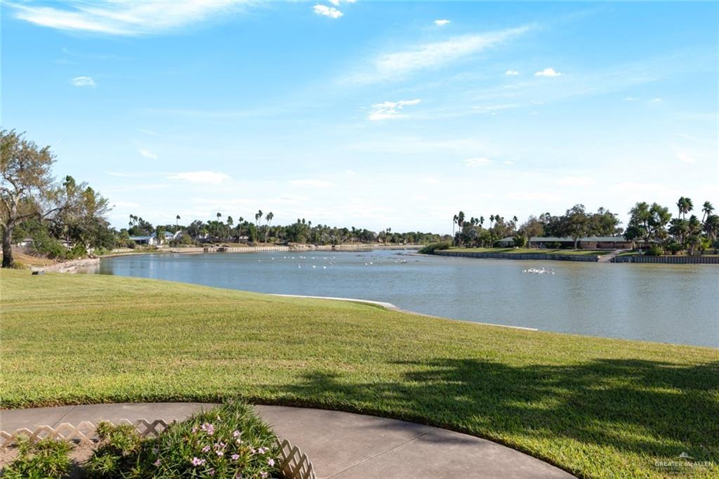 1420 West Estero Drive Progreso Lakes, TX 78596 - Photo 33 of 42 a view of a lake with a city view