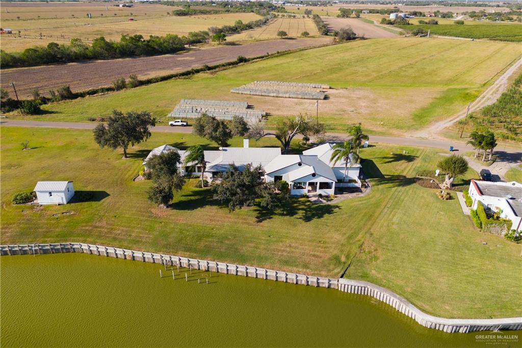 1420 West Estero Drive Progreso Lakes, TX 78596 - Photo 38 of 42 an aerial view of residential houses with outdoor space
