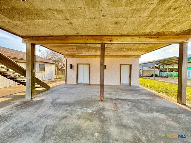a view of cabinets with wooden floor