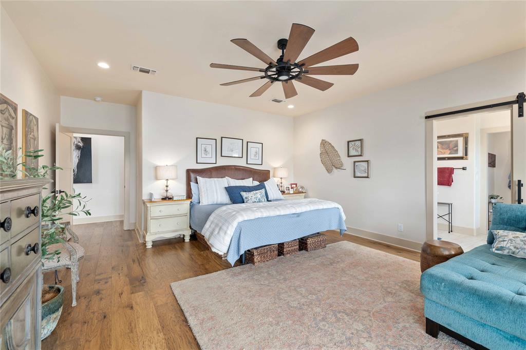 1010 Fm 583 Street West Rising Star, TX 76471 - Photo 25 of 40 a bedroom with a bed and wooden floor