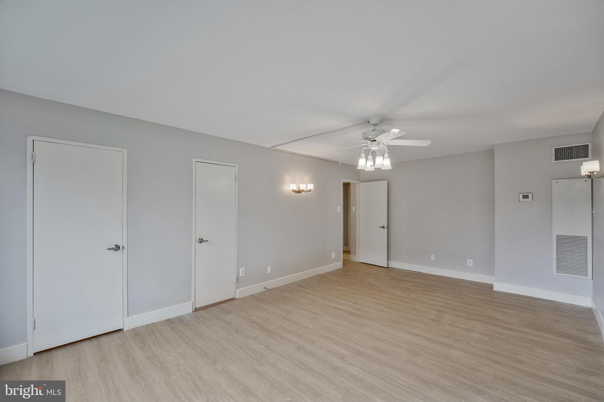 5101 River Road, Unit 1702 Bethesda, MD 20816 - Photo 19 of 38 Primary bedroom from window to entrance door