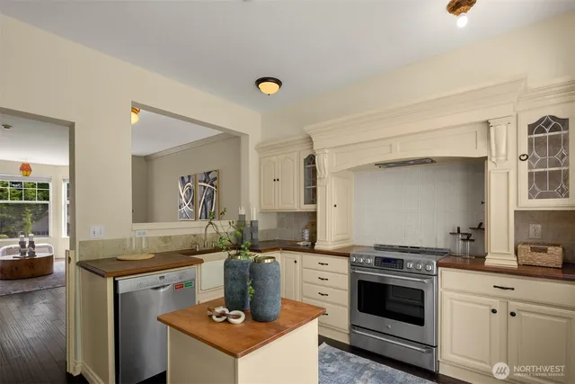 a kitchen with a stove and a sink