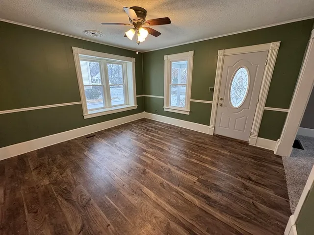 an empty room with windows