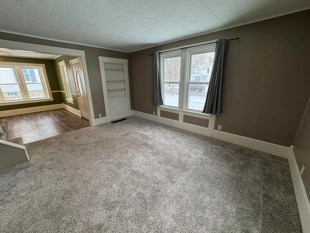 an empty room with windows