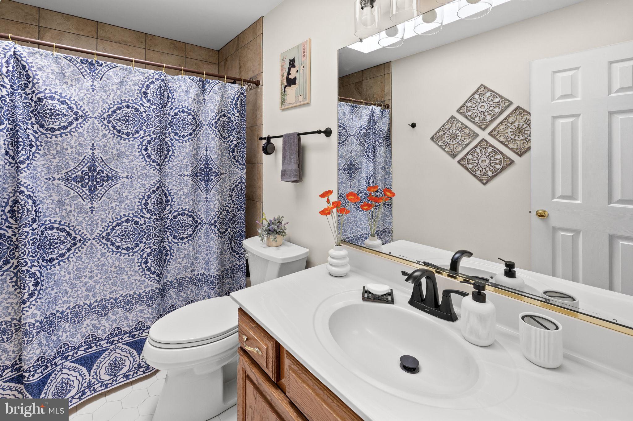 100 Boscobel Road Fredericksburg, VA 22405 - Photo 45 of 67 a bathroom with a sink mirror vanity and toilet