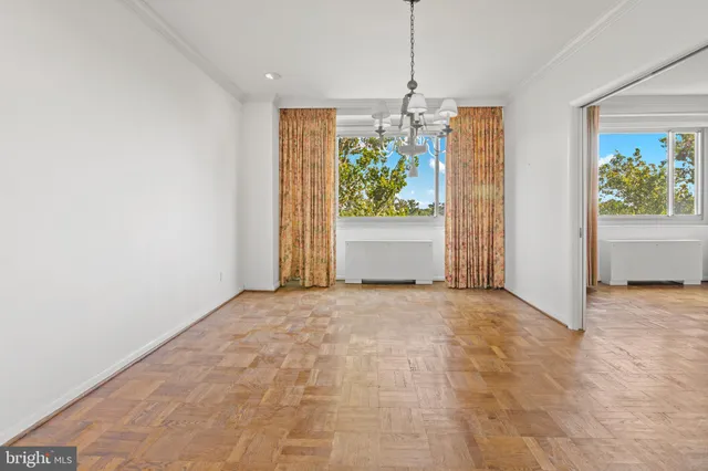 a view of an empty room and window