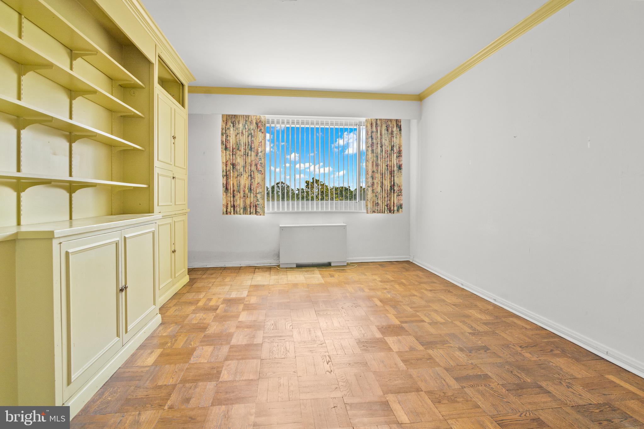 11 Slade Avenue, Unit 712 Baltimore, MD 21208 - Photo 15 of 30 a view of an empty room with a window