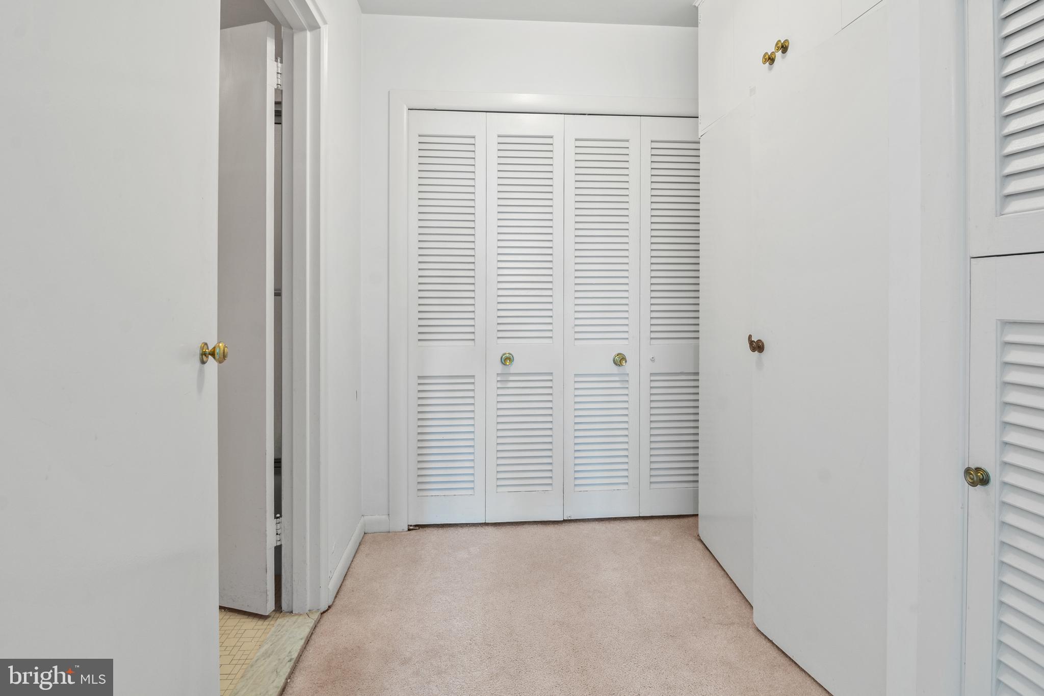 11 Slade Avenue, Unit 712 Baltimore, MD 21208 - Photo 22 of 30 an empty room with windows