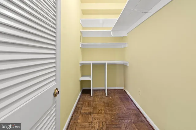 a bathroom with a toilet and shower