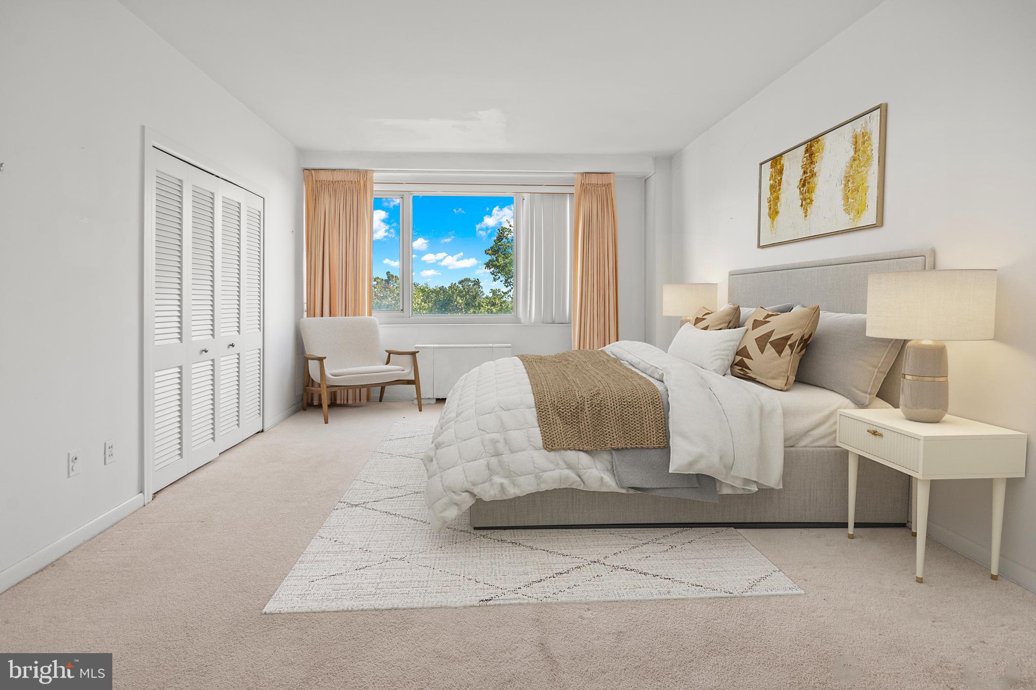 11 Slade Avenue, Unit 712 Baltimore, MD 21208 - Photo 9 of 30 a living room with furniture and a flat screen tv
