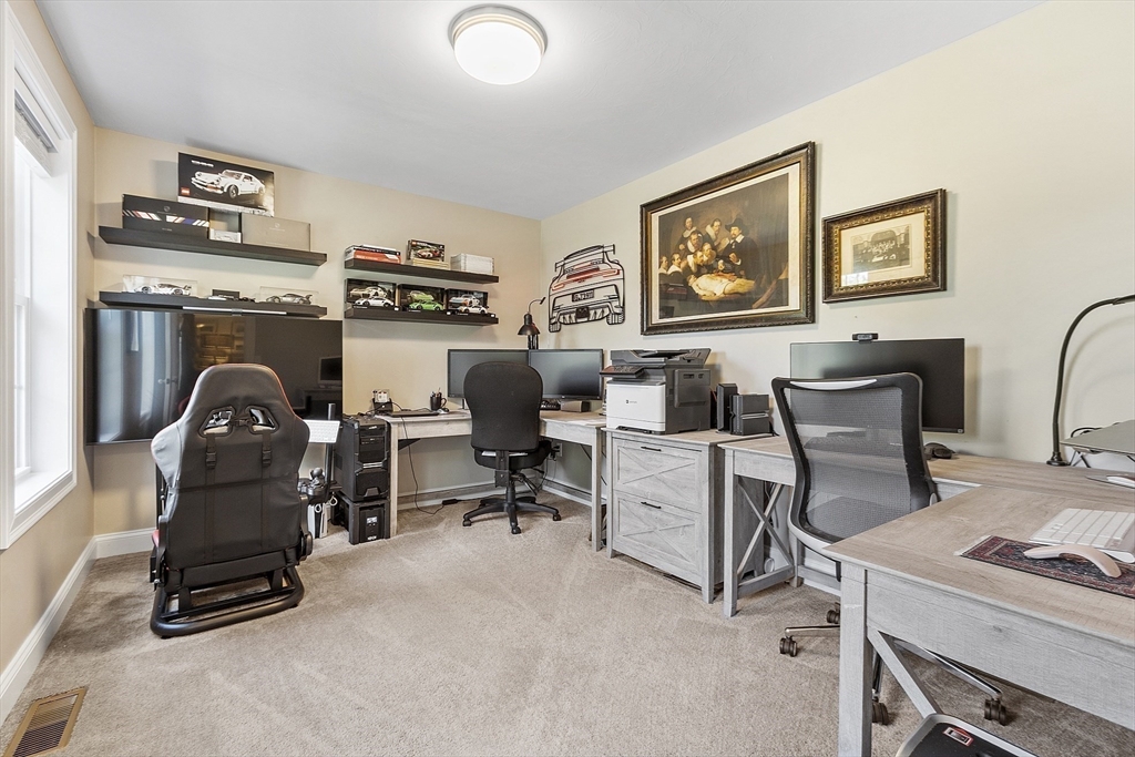 100 Platts Road Ashburnham, MA 01430 - Photo 18 of 42 a view of workspace with lounge chair and windows
