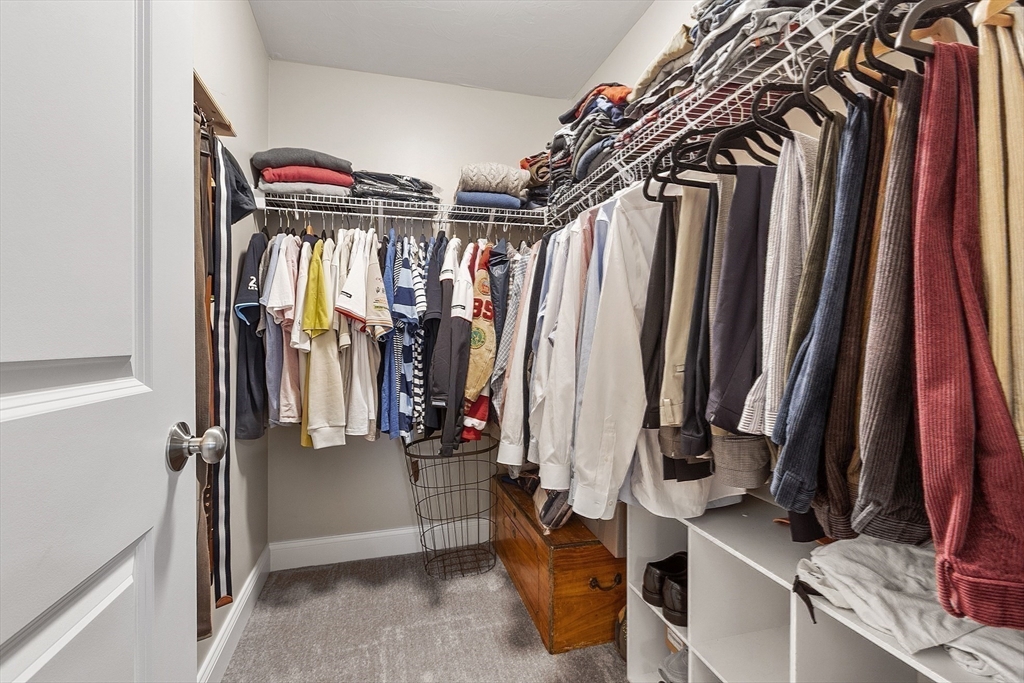 100 Platts Road Ashburnham, MA 01430 - Photo 24 of 42 a view of walk in closet with clothes and shoes