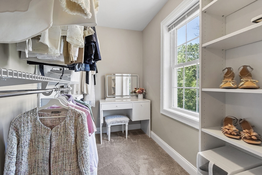 100 Platts Road Ashburnham, MA 01430 - Photo 25 of 42 a view of walk in closet with clothes and shoes