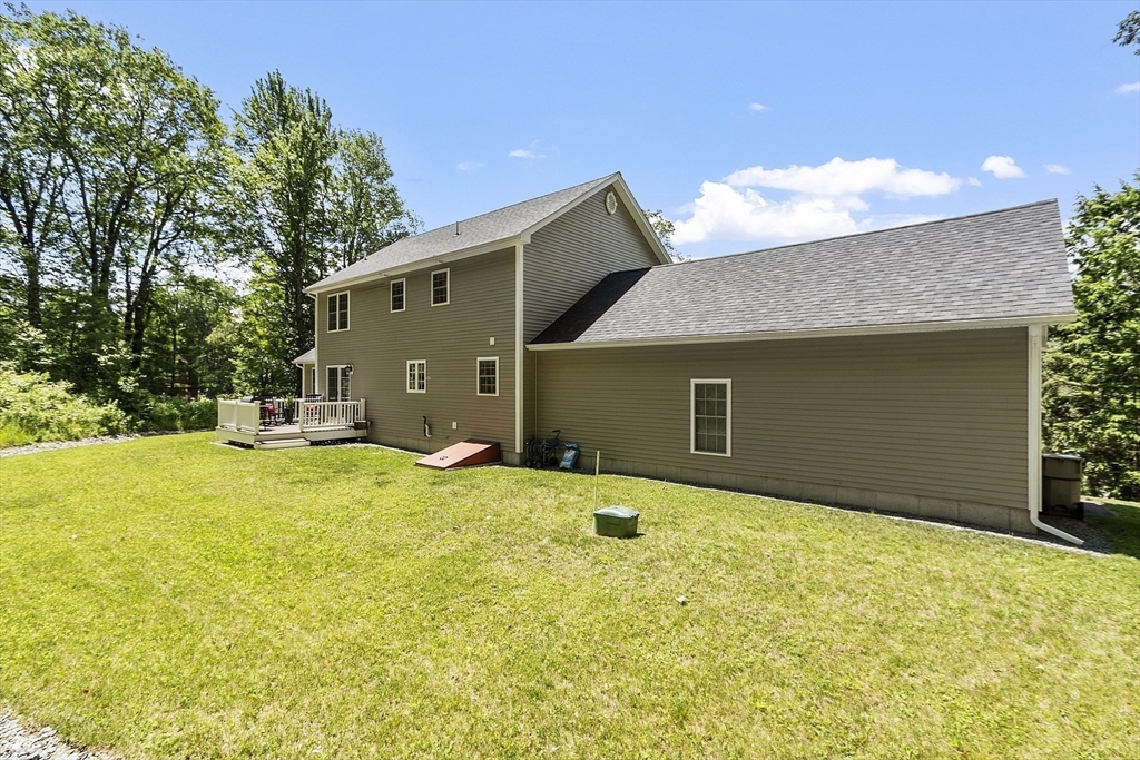 100 Platts Road Ashburnham, MA 01430 - Photo 37 of 42 a house with a yard