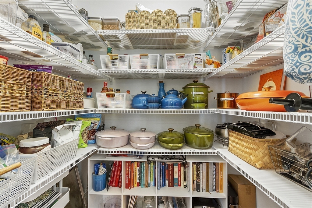 100 Platts Road Ashburnham, MA 01430 - Photo 40 of 42 a kitchen with lots of clutter and stainless steel appliances