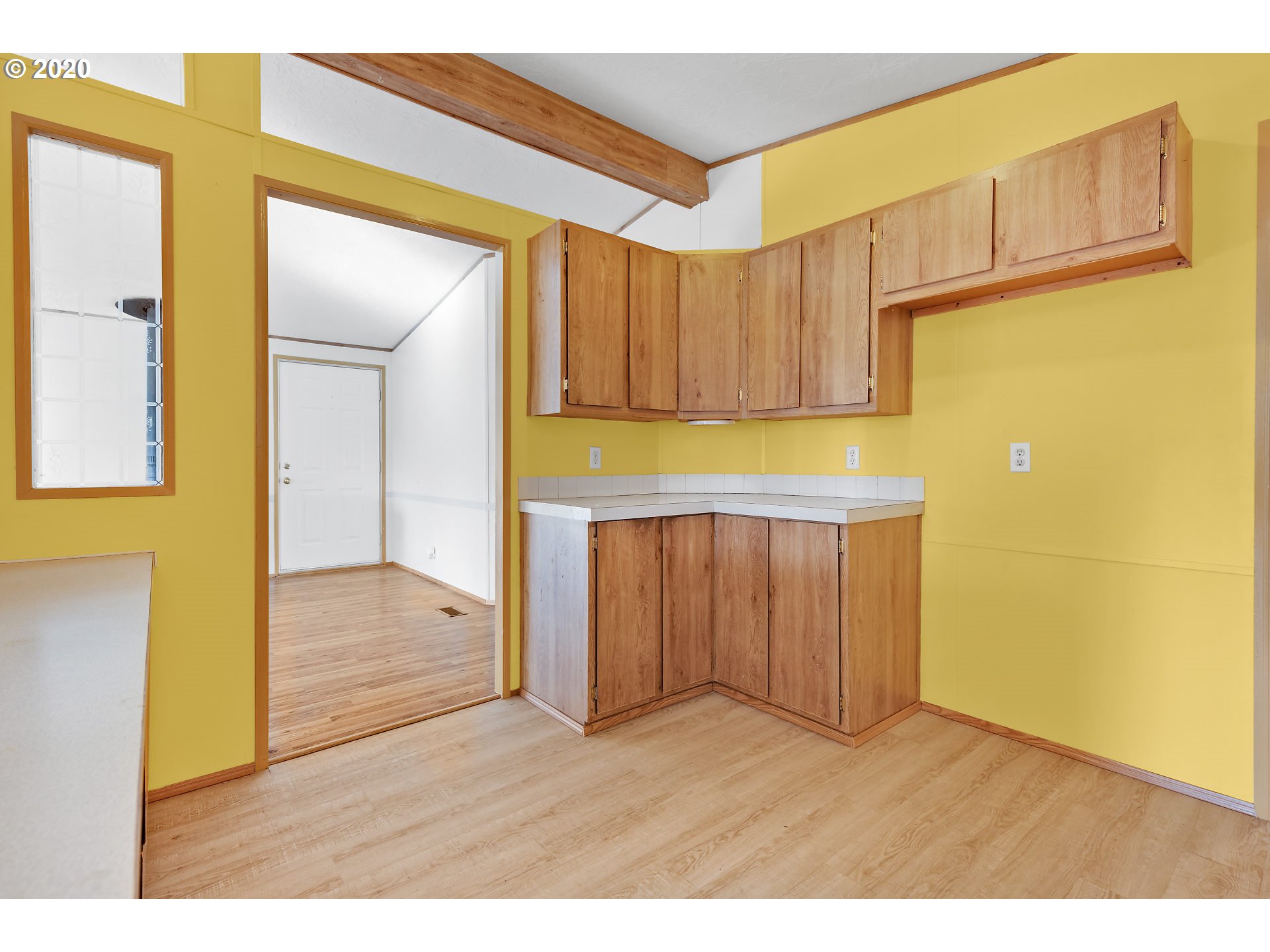 70435 Forest Park Road Rainier, OR 97048 - Photo 9 of 29 a view of an empty room and wooden floor