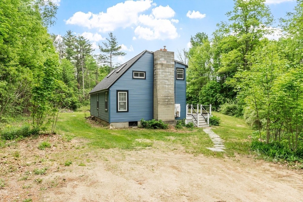 258 Allen Road Ashby, MA 01431 - Photo 35 of 36 a view of a house with backyard