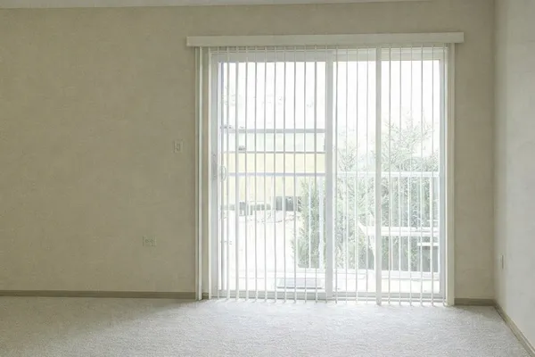 a view of a room with a large window
