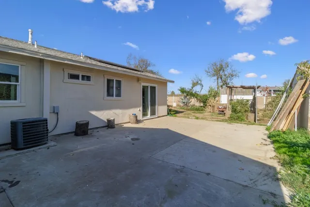 a view of a house with a patio