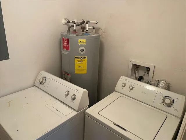 a utility room with dryer and washer