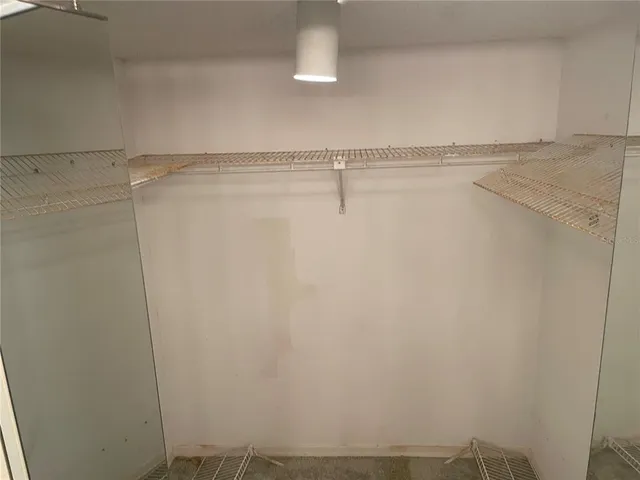 a view of small space with racks on the wall