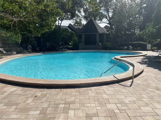 a view of swimming pool in a yard