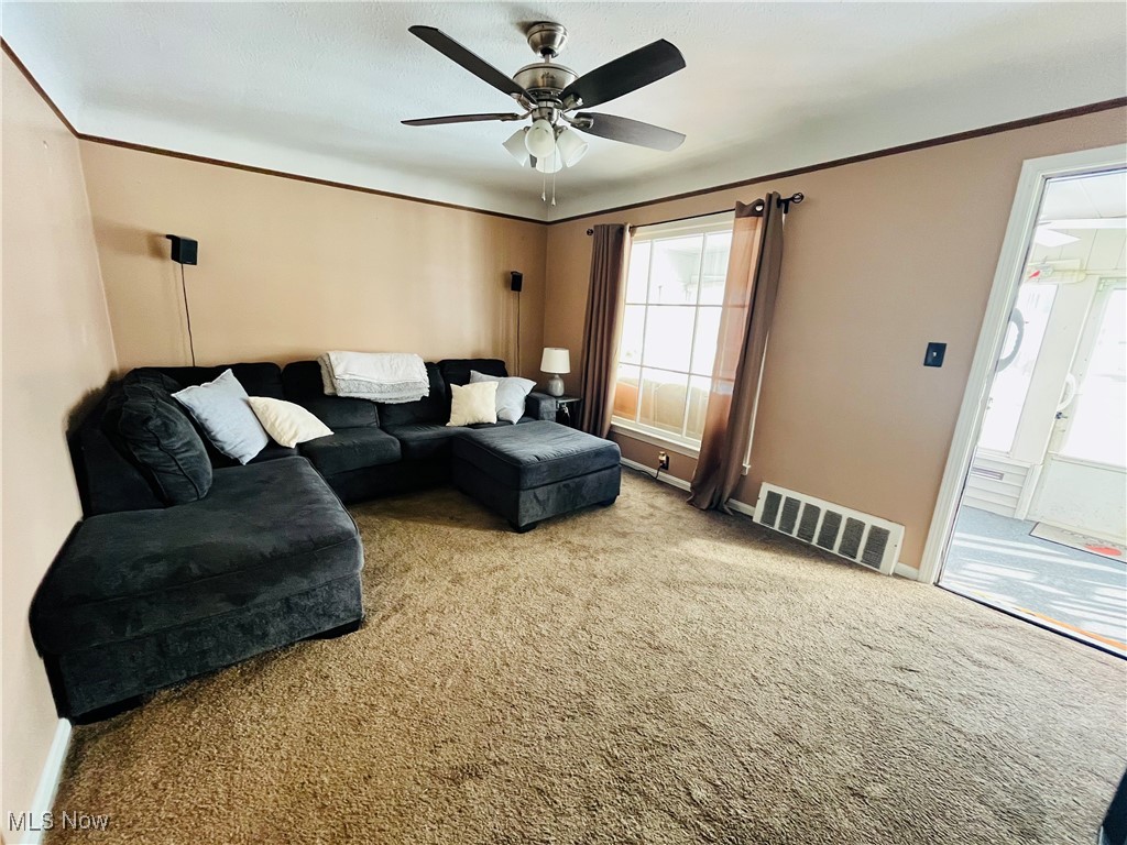 30009 Elgin Road Wickliffe, OH 44092 - Photo 15 of 44 Carpeted living room with ceiling fan