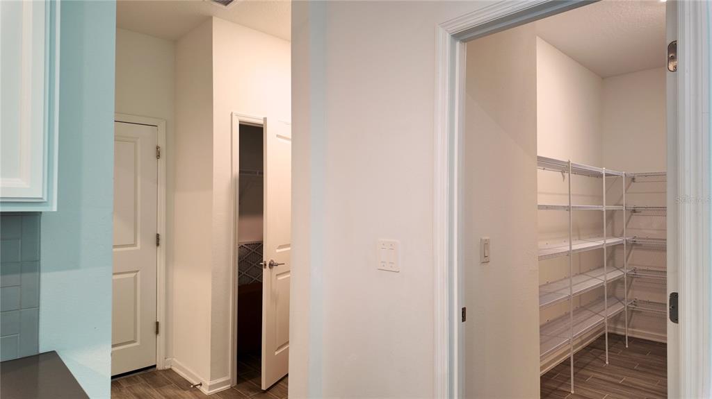 6366 Lakepine Street St. Cloud, FL 34771 - Photo 22 of 22 a view of walk in closet with empty racks