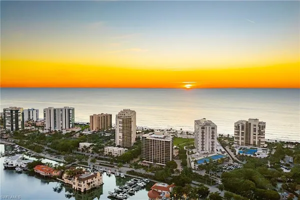 a view of a city with tall buildings