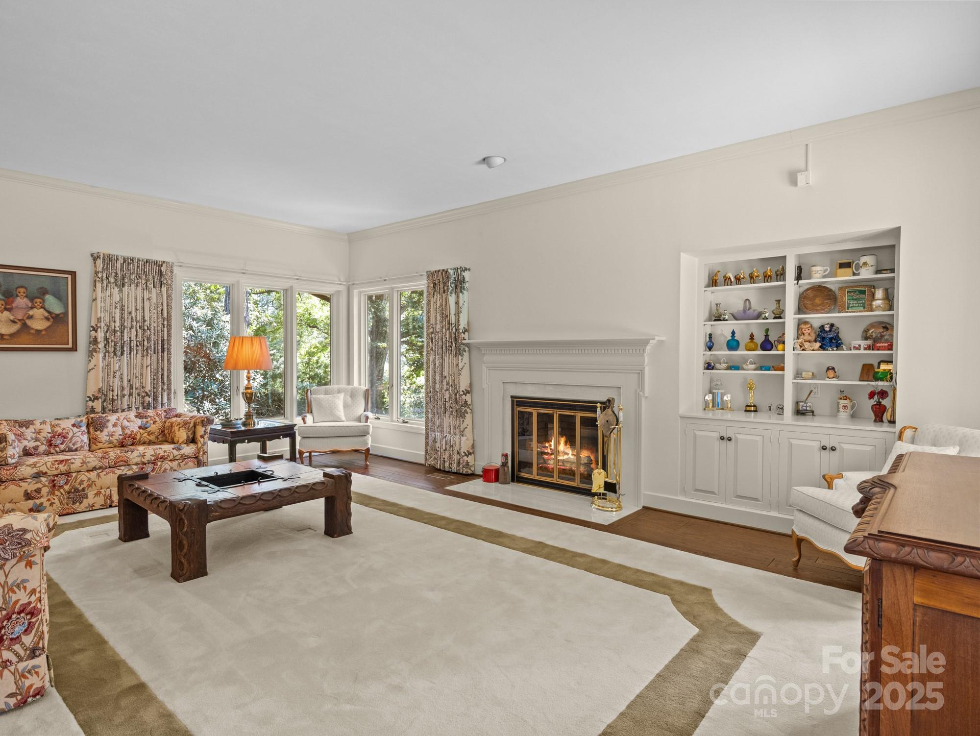 831 Hooper Creek Road Tryon, NC 28782 - Photo 14 of 48 a living room with furniture or couch and a fireplace