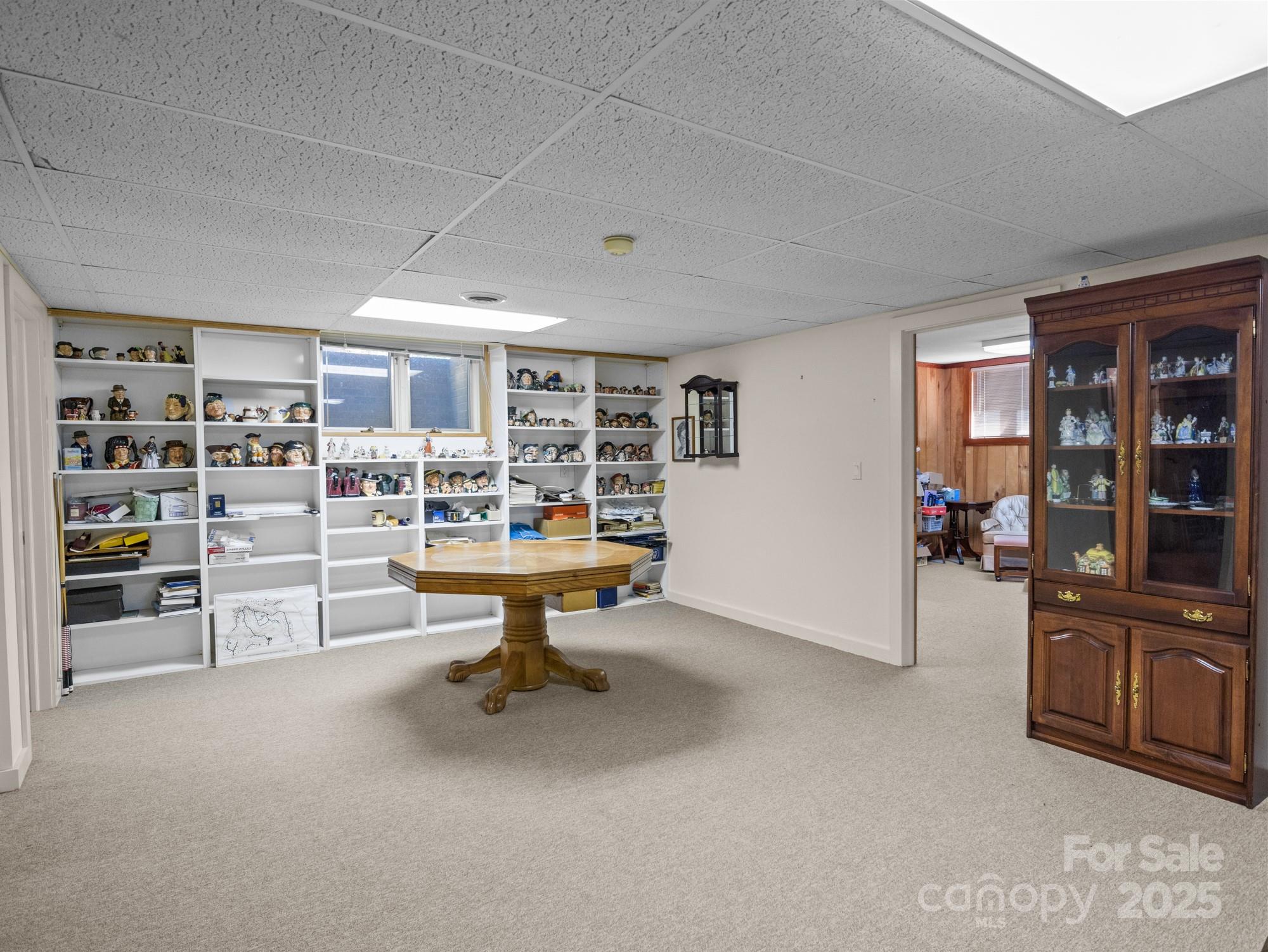 831 Hooper Creek Road Tryon, NC 28782 - Photo 38 of 48 a view of a workspace with furniture
