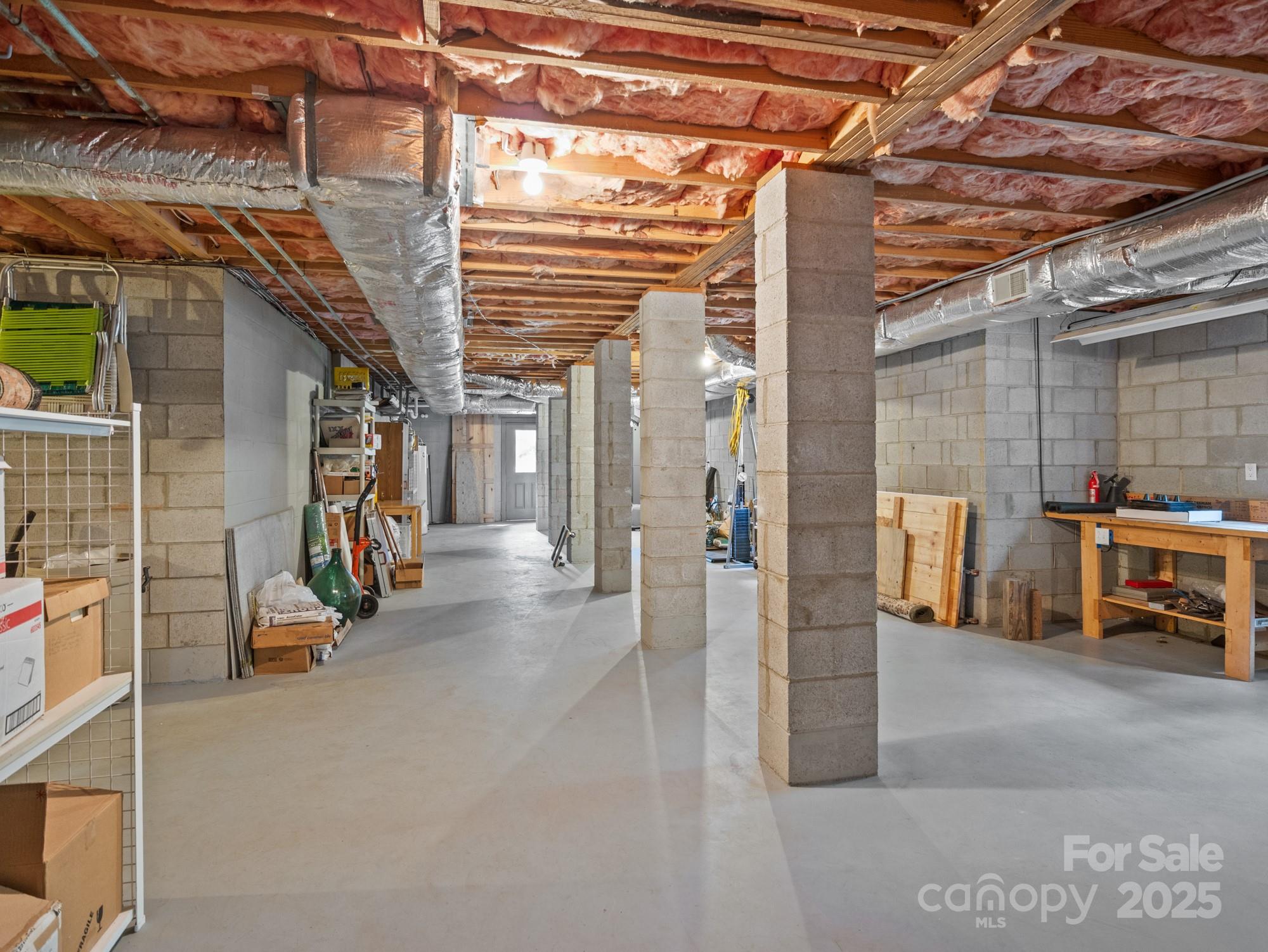 831 Hooper Creek Road Tryon, NC 28782 - Photo 40 of 48 a view of a room with wooden roof