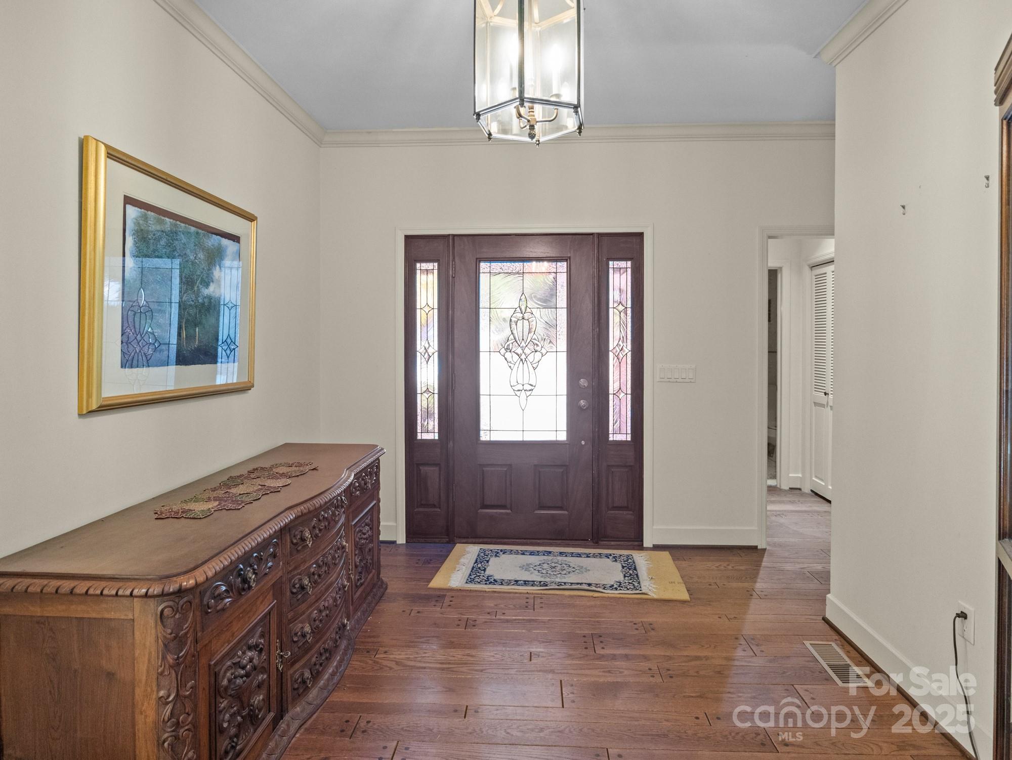 831 Hooper Creek Road Tryon, NC 28782 - Photo 4 of 48 a view of kitchen with granite countertop cabinets and wooden floor