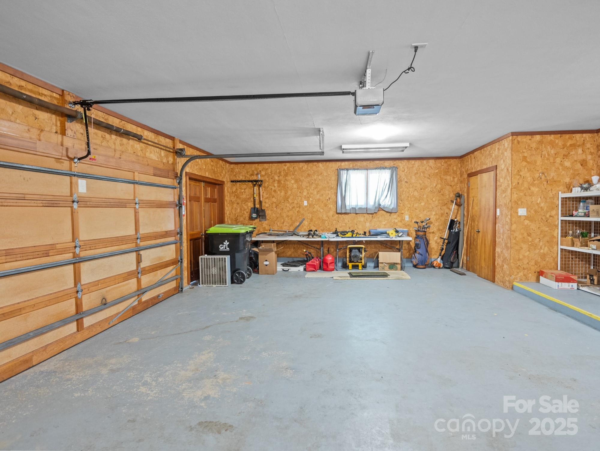 831 Hooper Creek Road Tryon, NC 28782 - Photo 44 of 48 a view of a livingroom with furniture and a window