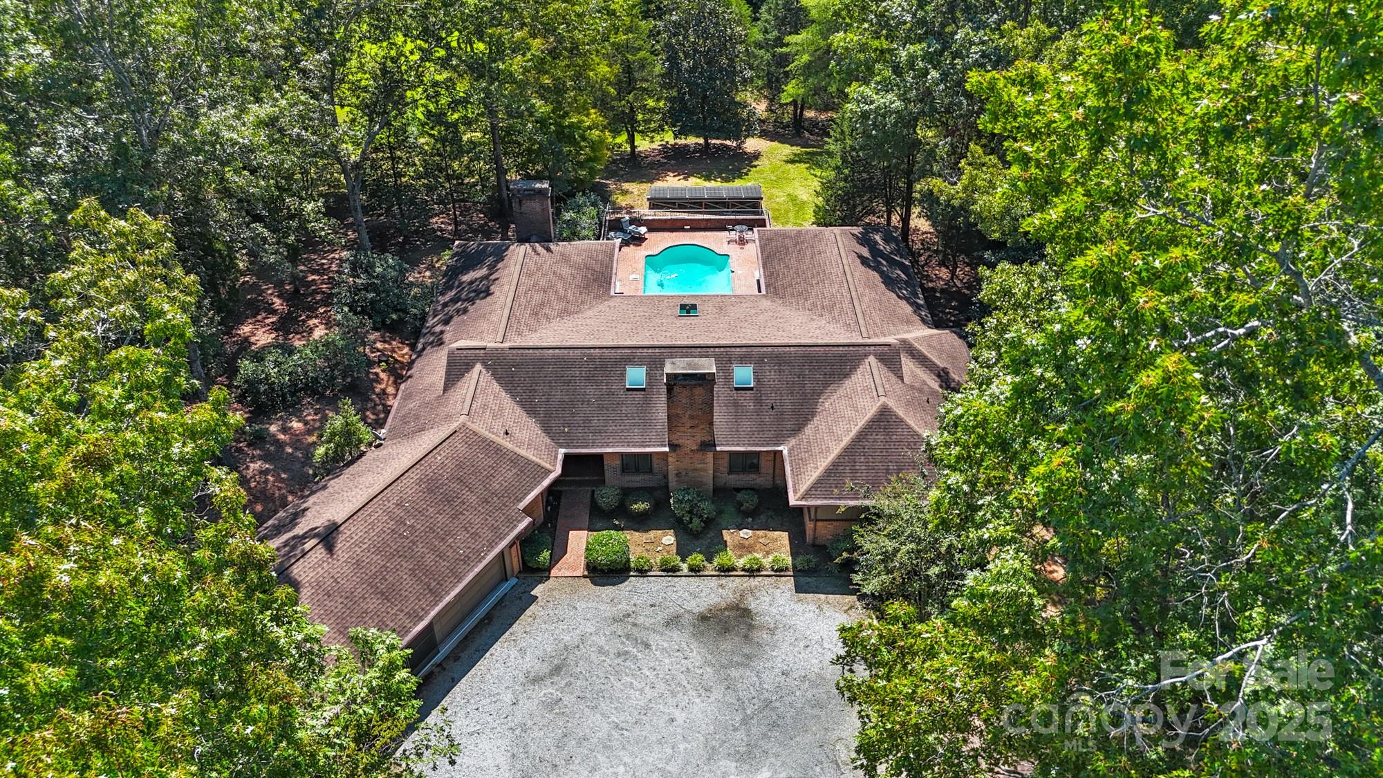 831 Hooper Creek Road Tryon, NC 28782 - Photo 45 of 48 a view of a back yard of the house