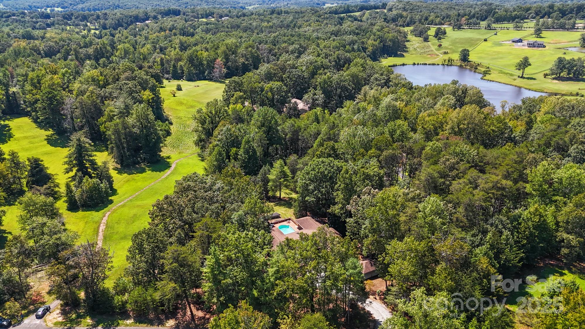 831 Hooper Creek Road Tryon, NC 28782 - Photo 47 of 48 a view of a houses with a lake view
