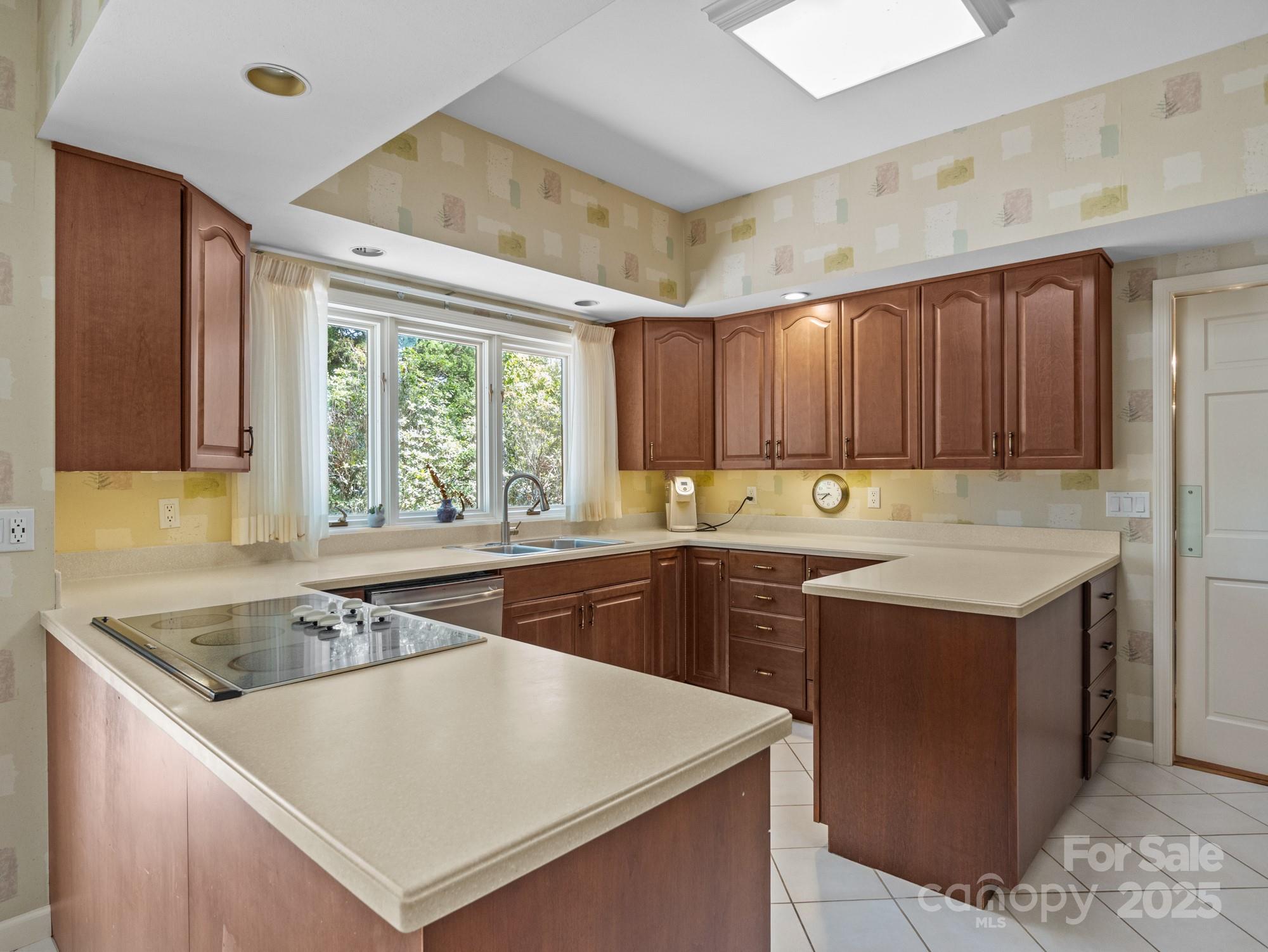 831 Hooper Creek Road Tryon, NC 28782 - Photo 5 of 48 a kitchen that has a sink in it