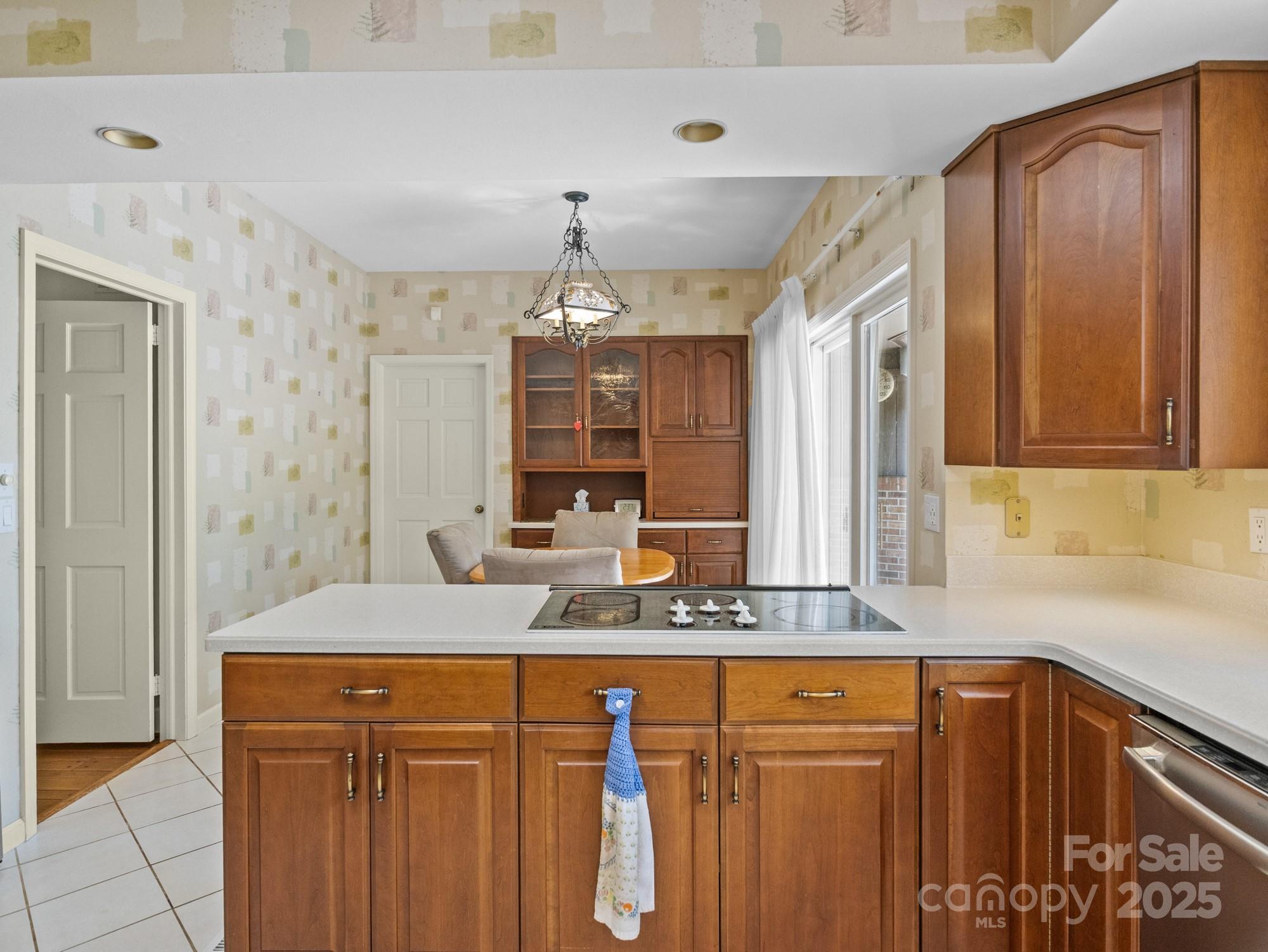 831 Hooper Creek Road Tryon, NC 28782 - Photo 6 of 48 a view of a kitchen from a hallway